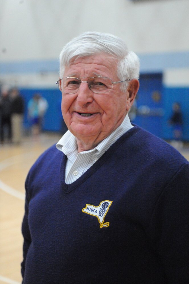 Gerald “Jerry” Davitt attending a boys’ basketball game at  Fred “Coach” Ahart’s “Home of the Blue Devils” at Roscoe Central School.